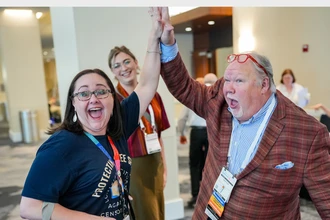 woman and man high-five