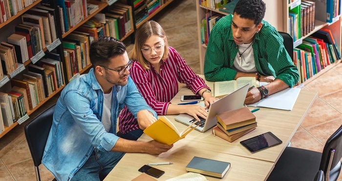a group of adults enjoy library's resources and services