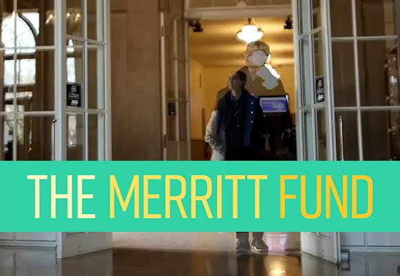 The Merritt Fund (blurred photo of person fading as the leave a library